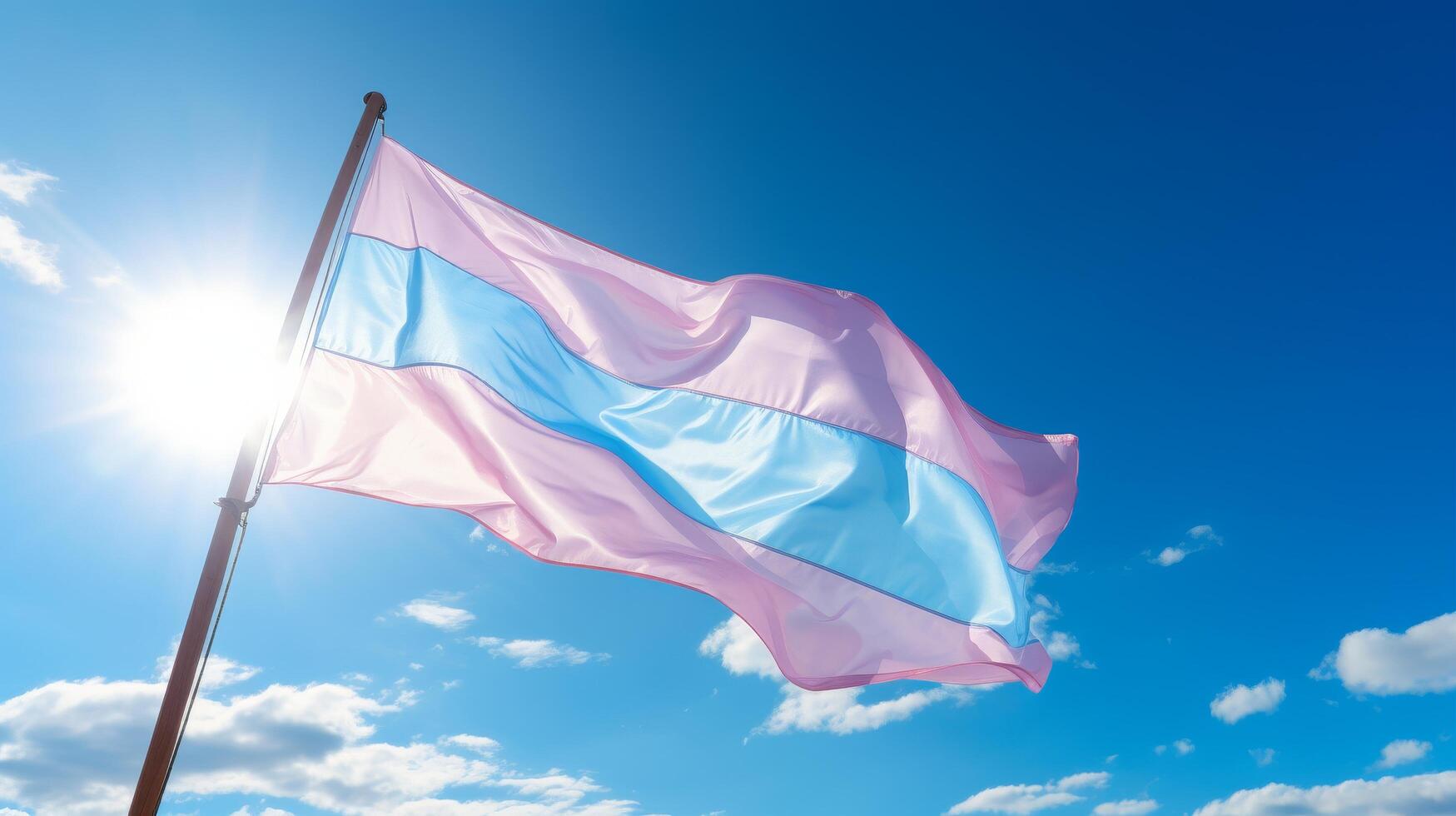 Transgender pride flag waving in the wind photo