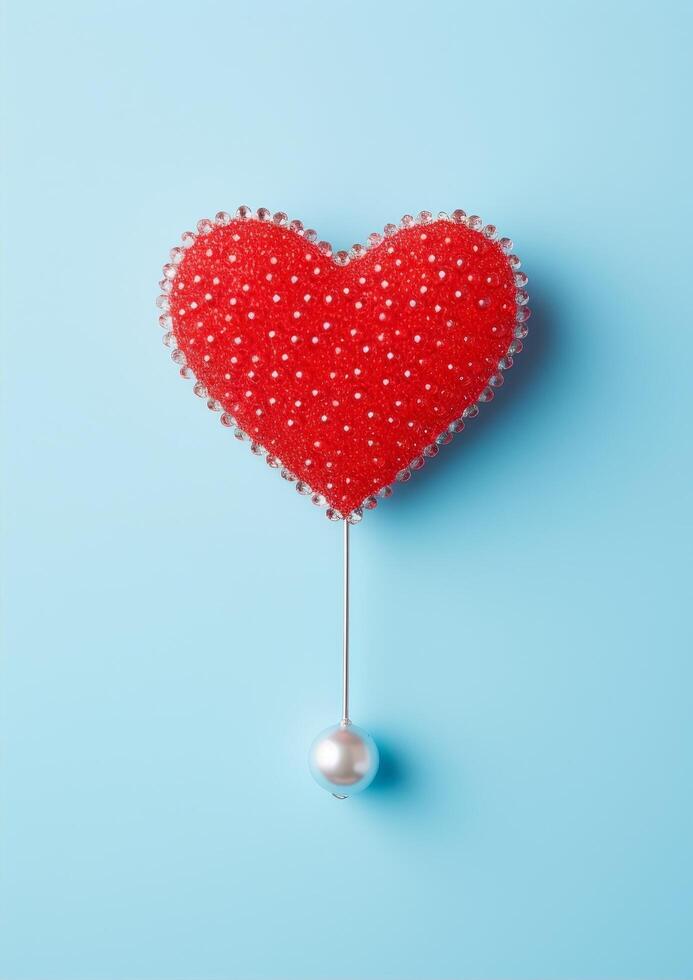 red heart shaped decoration with pearl photo