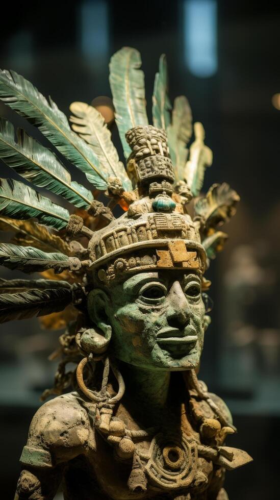 ancient mayan statue with feathered headdress photo