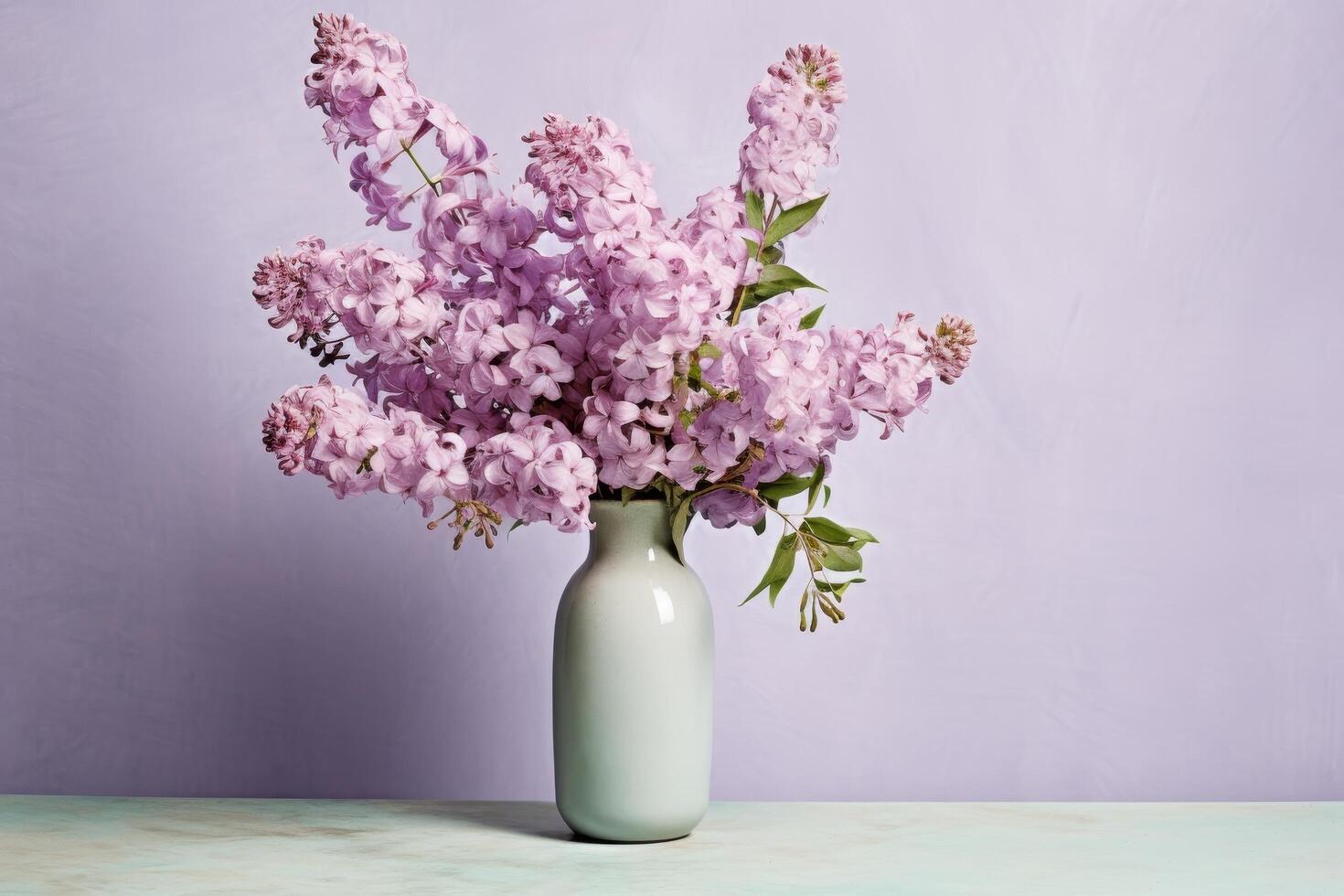 beautiful bouquet of purple lilac flowers in vase photo