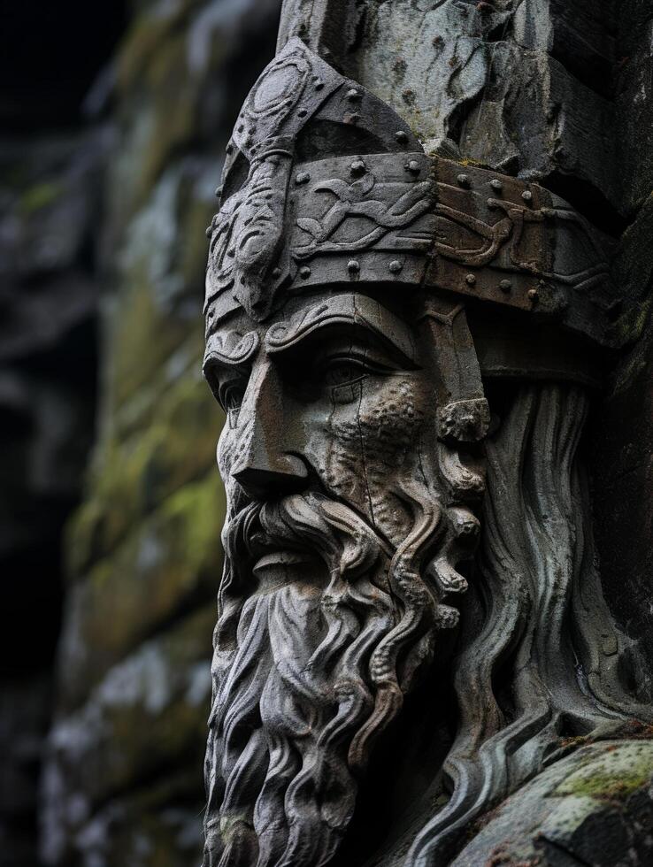 ancient stone carving of a bearded man with intricate details photo