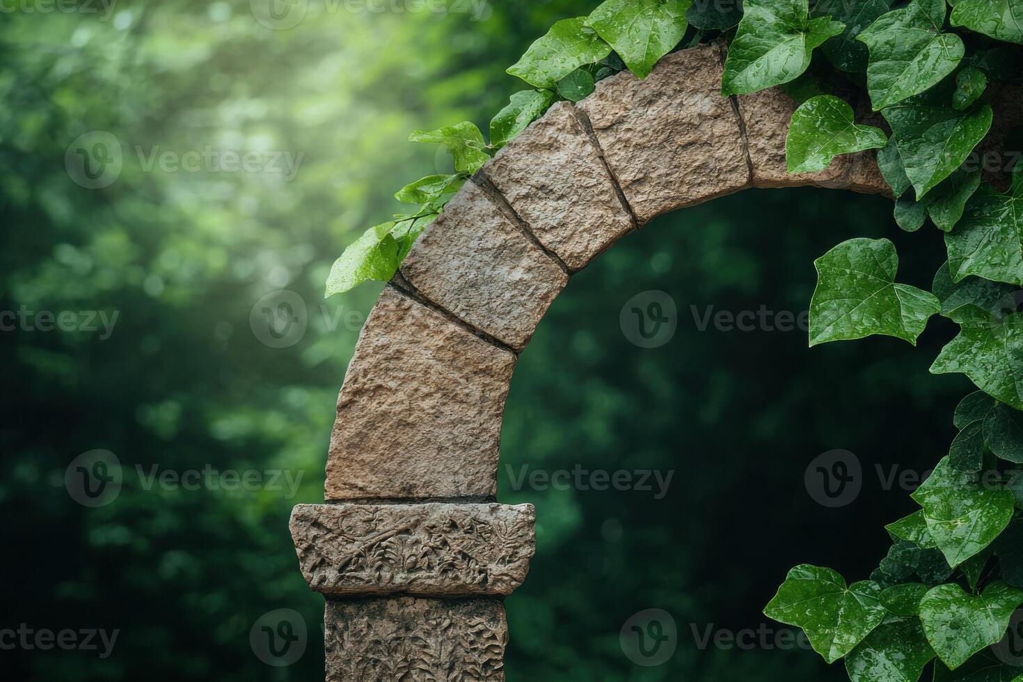 Stone archway overgrown with ivy in a lush forest setting photo