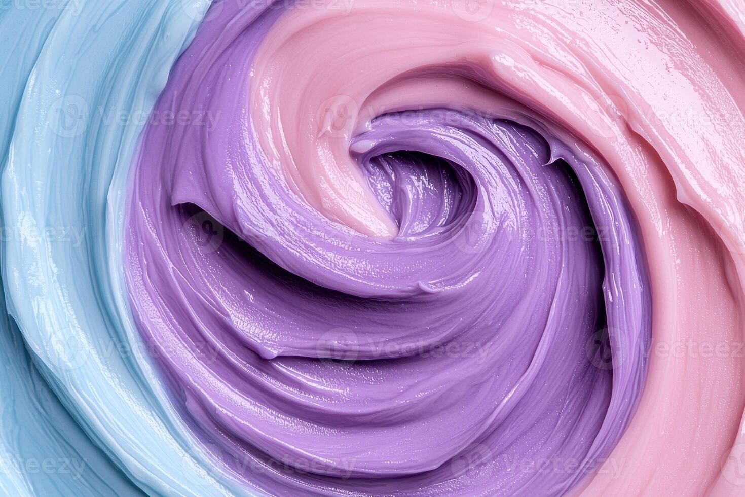 A swirl of blue and pink liquid photo