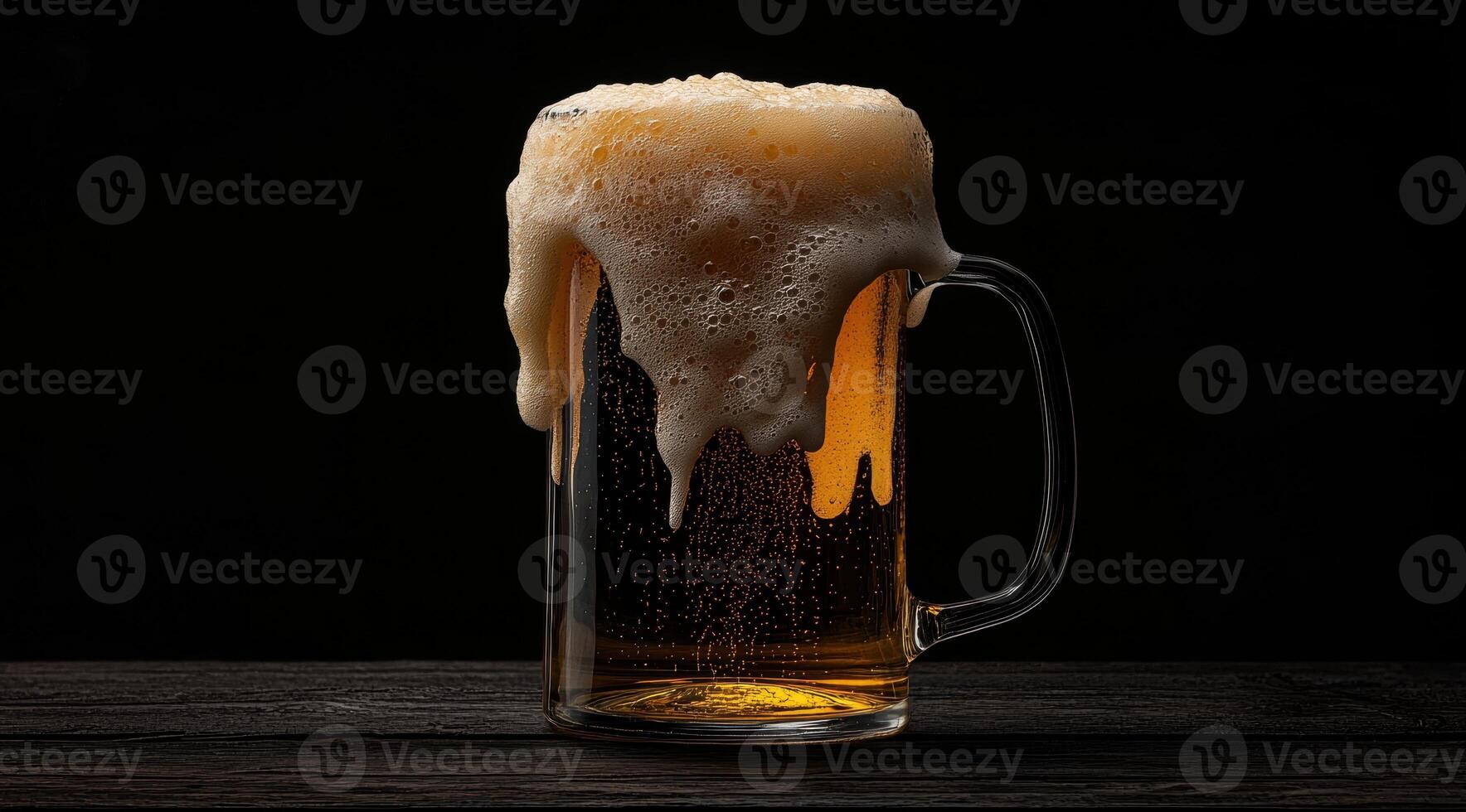 Close up of a frosty beer mug overflowing with foam on a dark wooden table photo