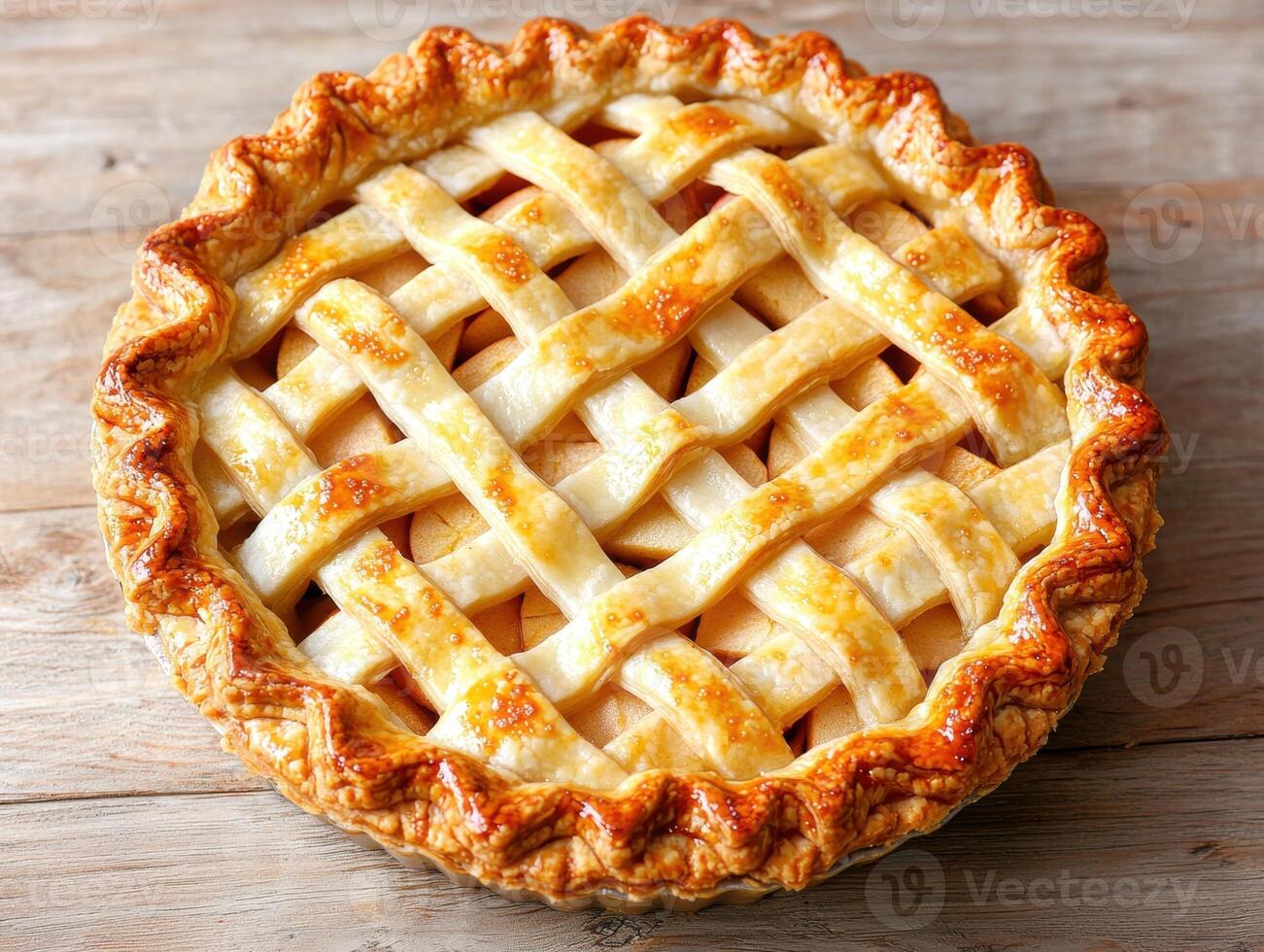 Delicious golden brown apple pie with a lattice crust, freshly baked photo