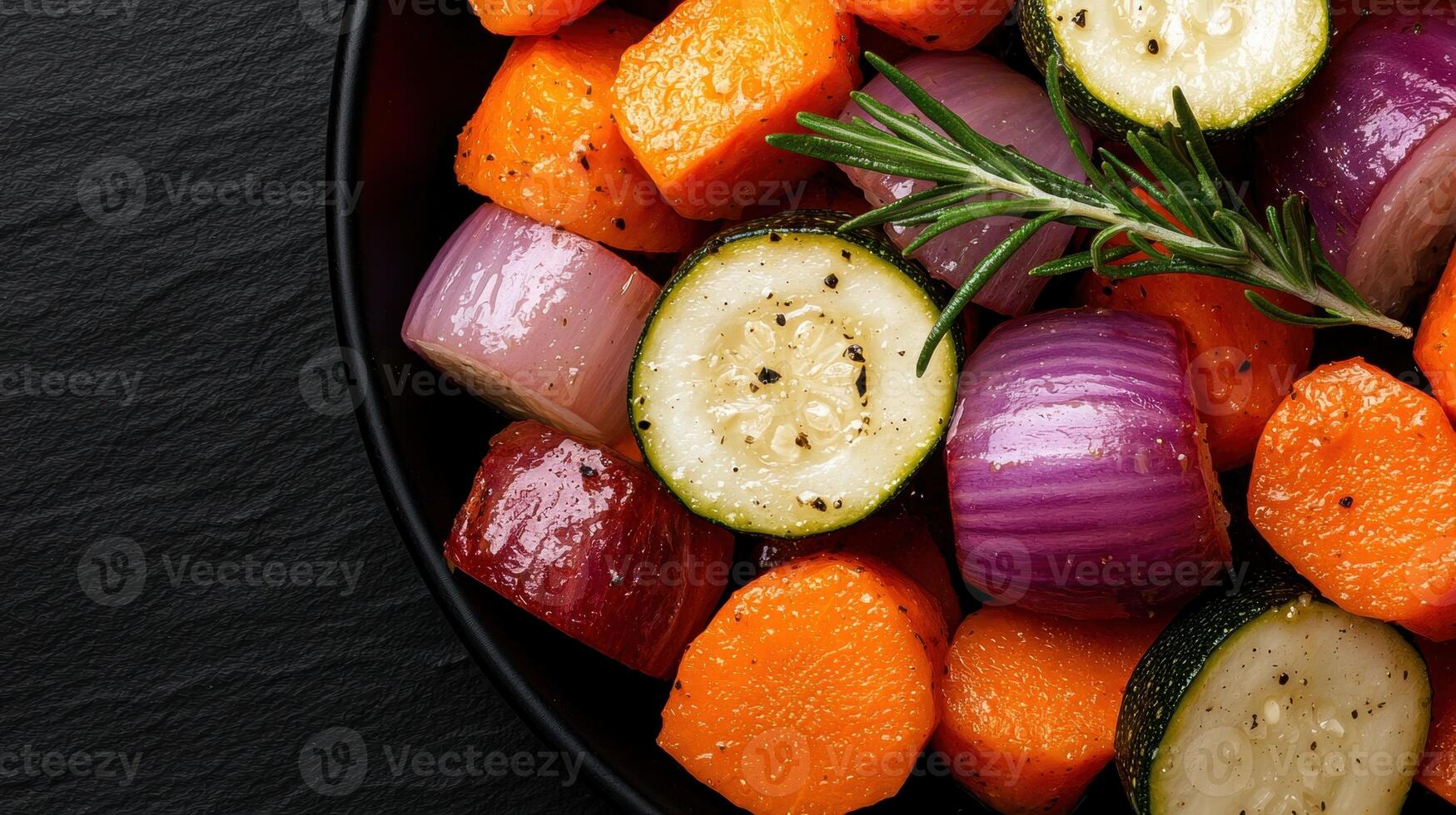 Roasted root vegetables and zucchini with rosemary photo