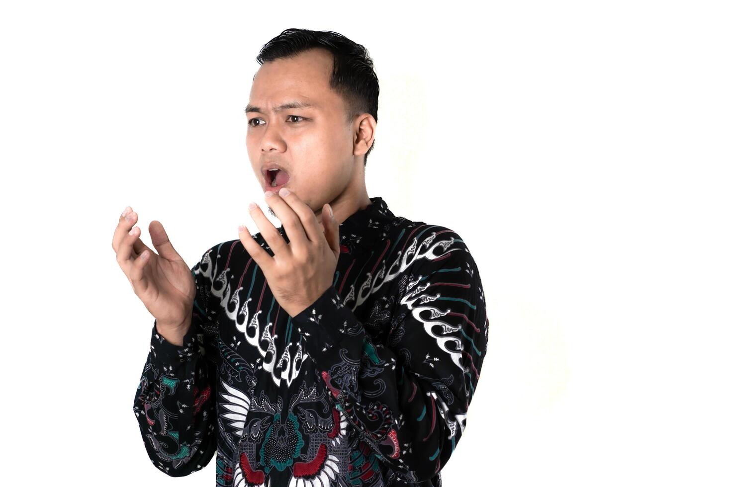 Surprised Expression of a Man in Batik Shirt photo