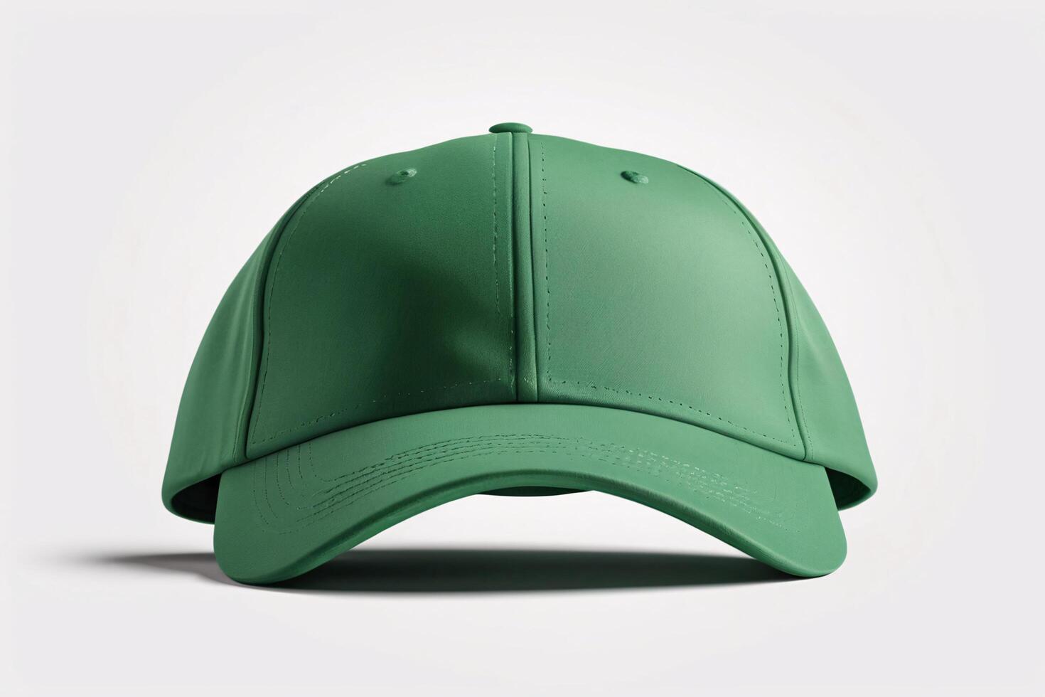 Green baseball cap isolated on white background. photo