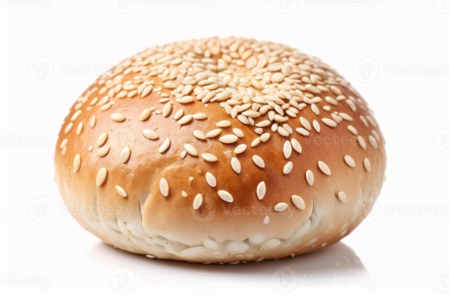 Close-up of a sesame seed bun on a white background. photo