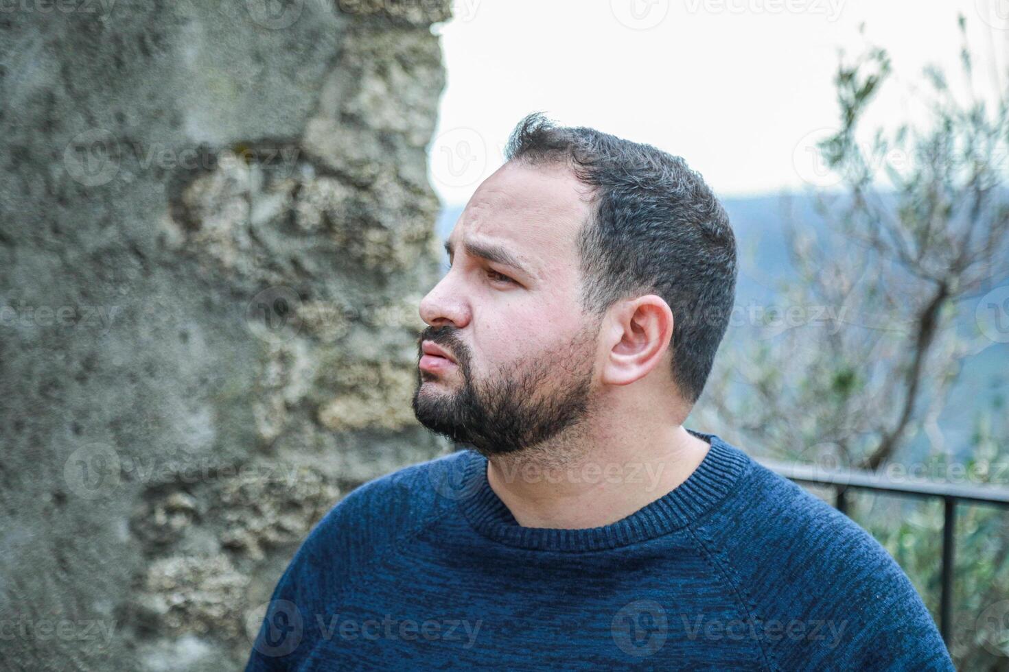 Man Struggles to Stay Warm Outside photo