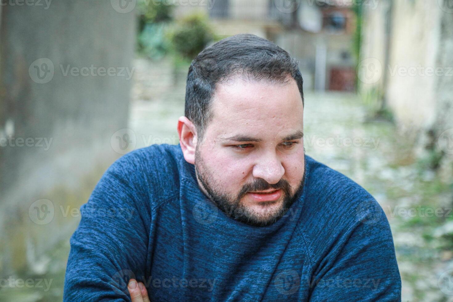Man Shivers in Icy Cold Weather photo