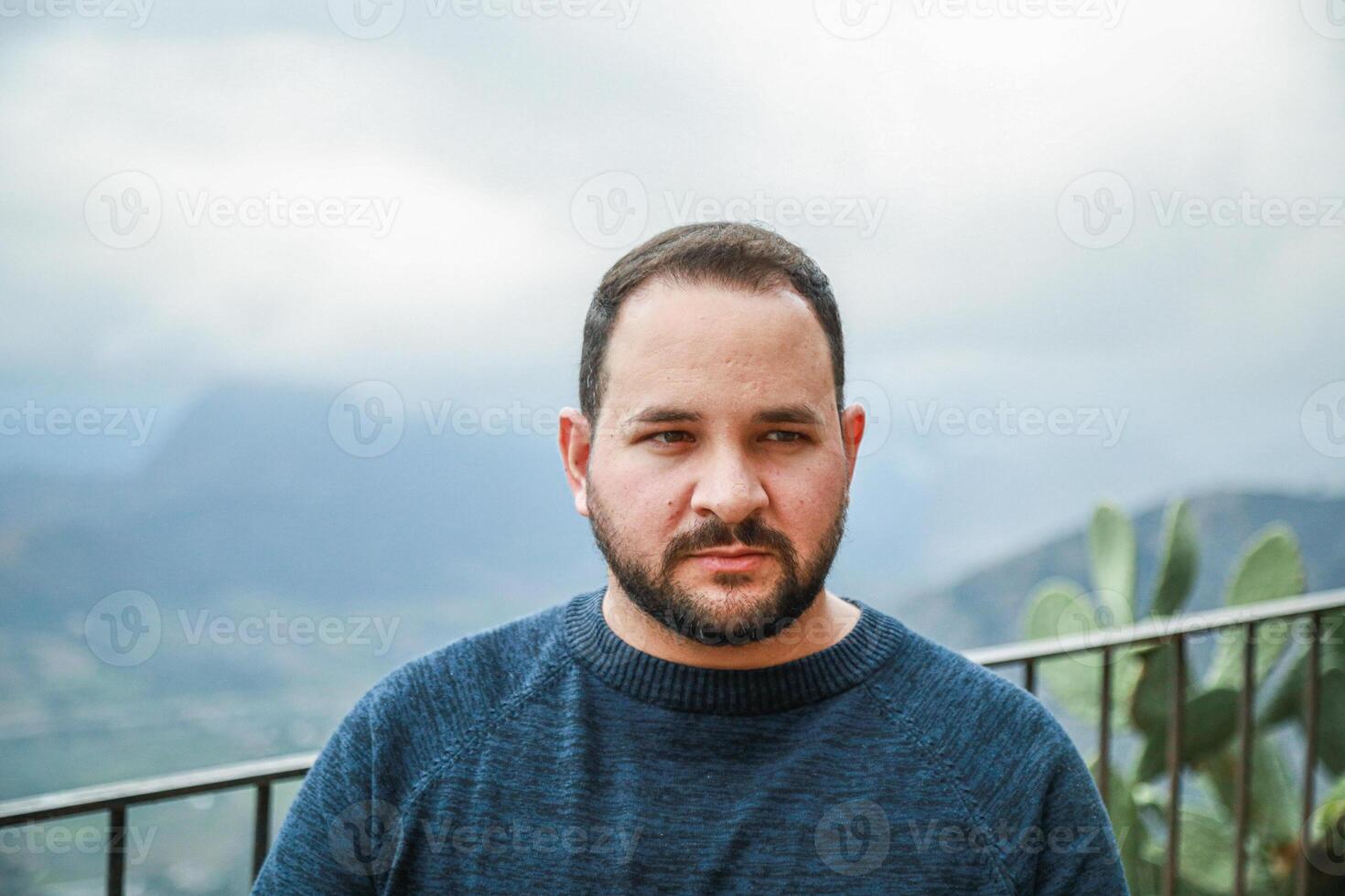 Man Looks On with Uneasy Eyes photo