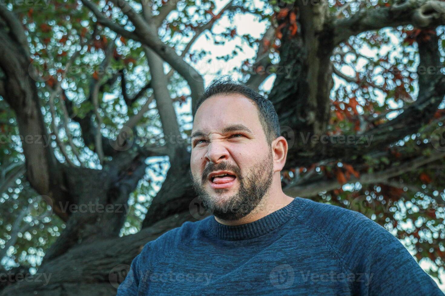 Man After A Bite Of A Sour Lemon photo
