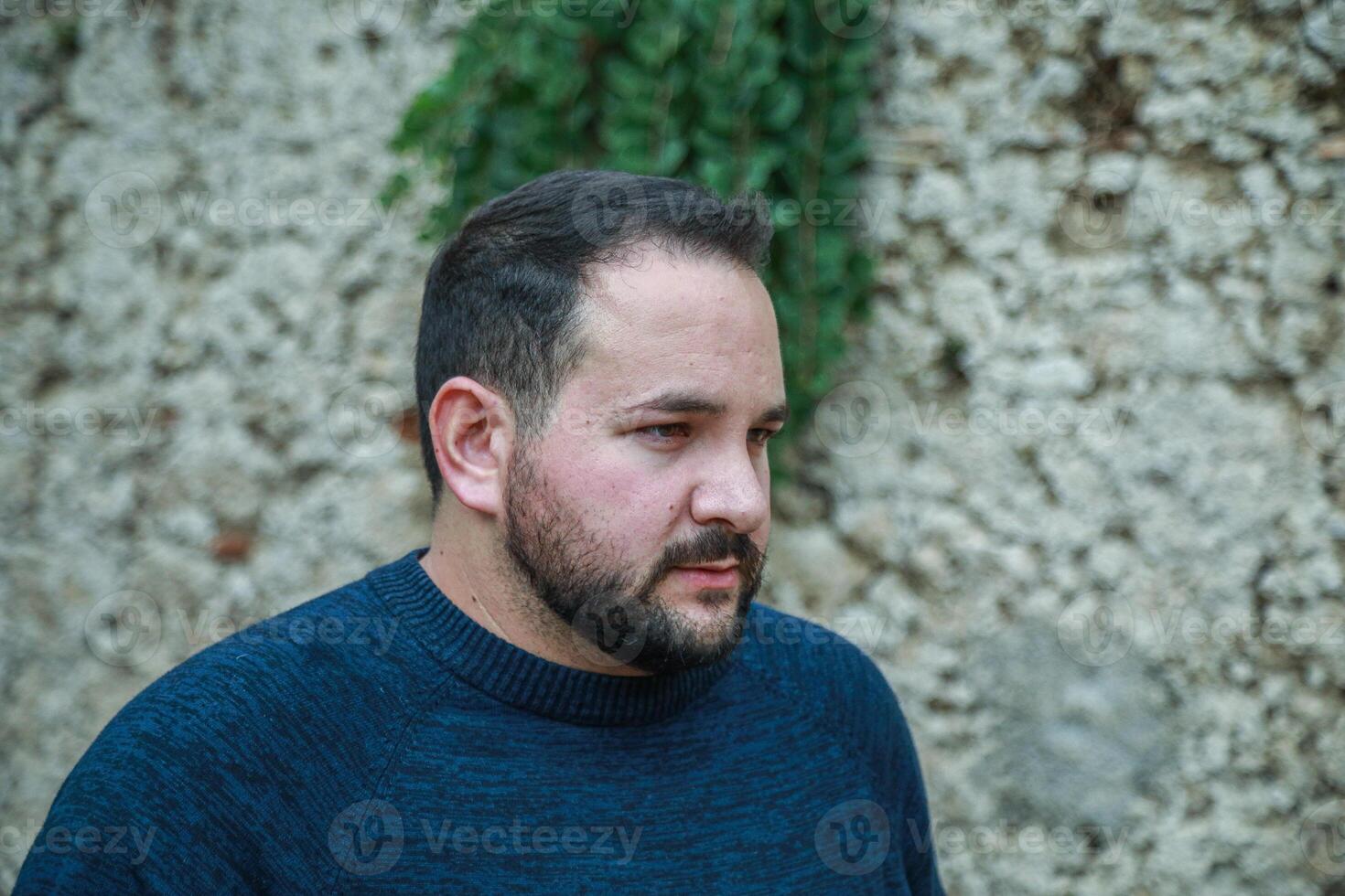 Icy Winds Make Man Shiver Outside photo
