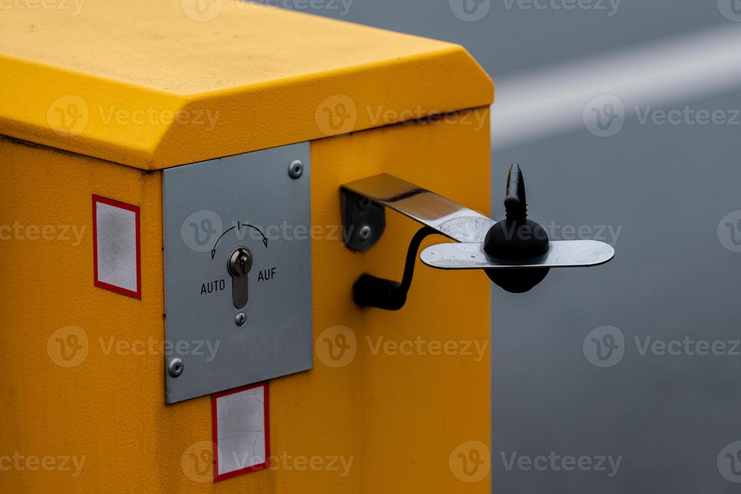 Yellow barrier control device for access management in a parking area photo
