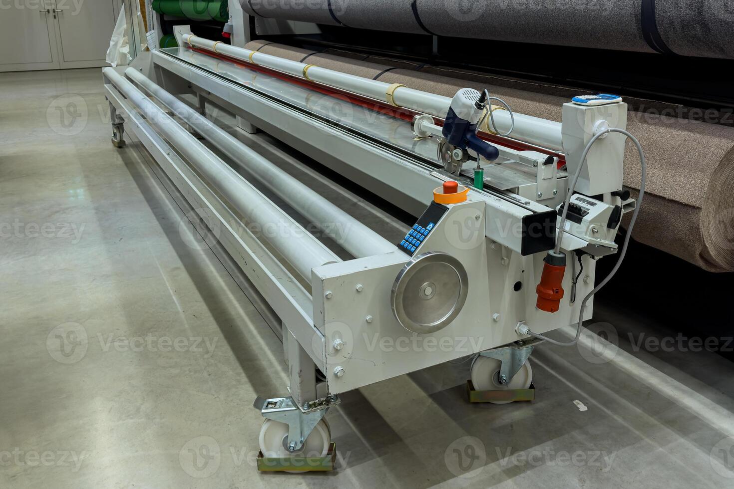 Machine for cutting carpets and linoleum. photo