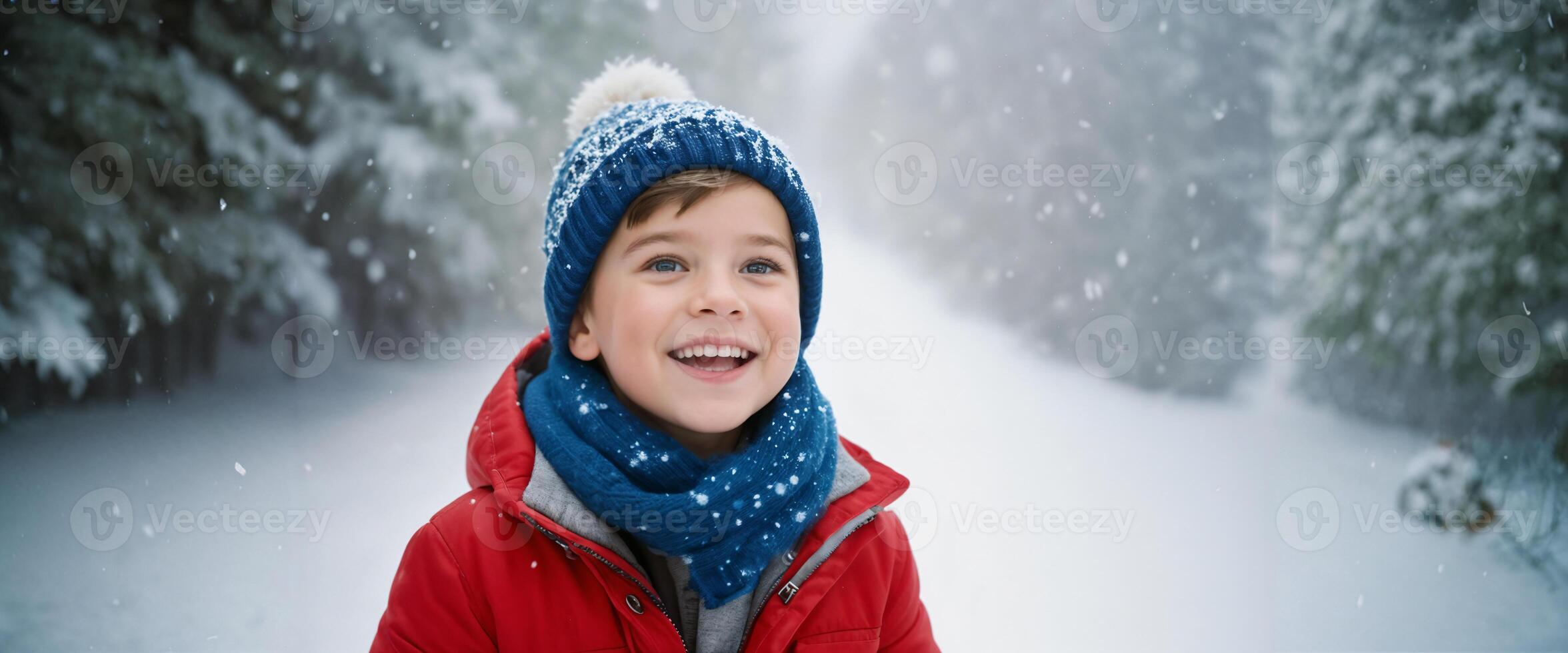 Happy boy in snow, expressive and playful winter fun moment. photo