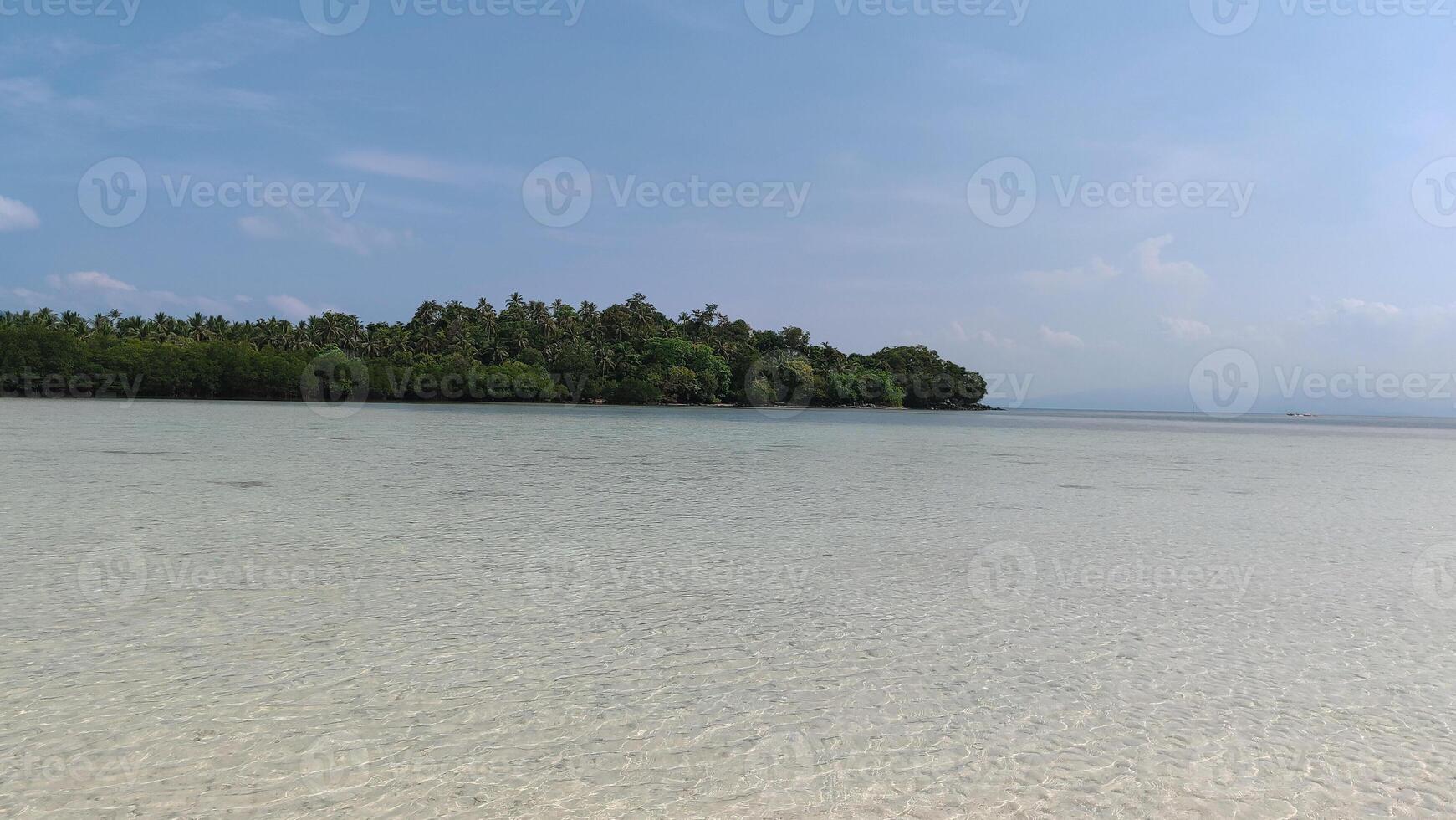 beautiful view of the tropical beach of Pahawang Island, Lampung. Landscape in the highland natural park. Panoramic view by the sea. photo
