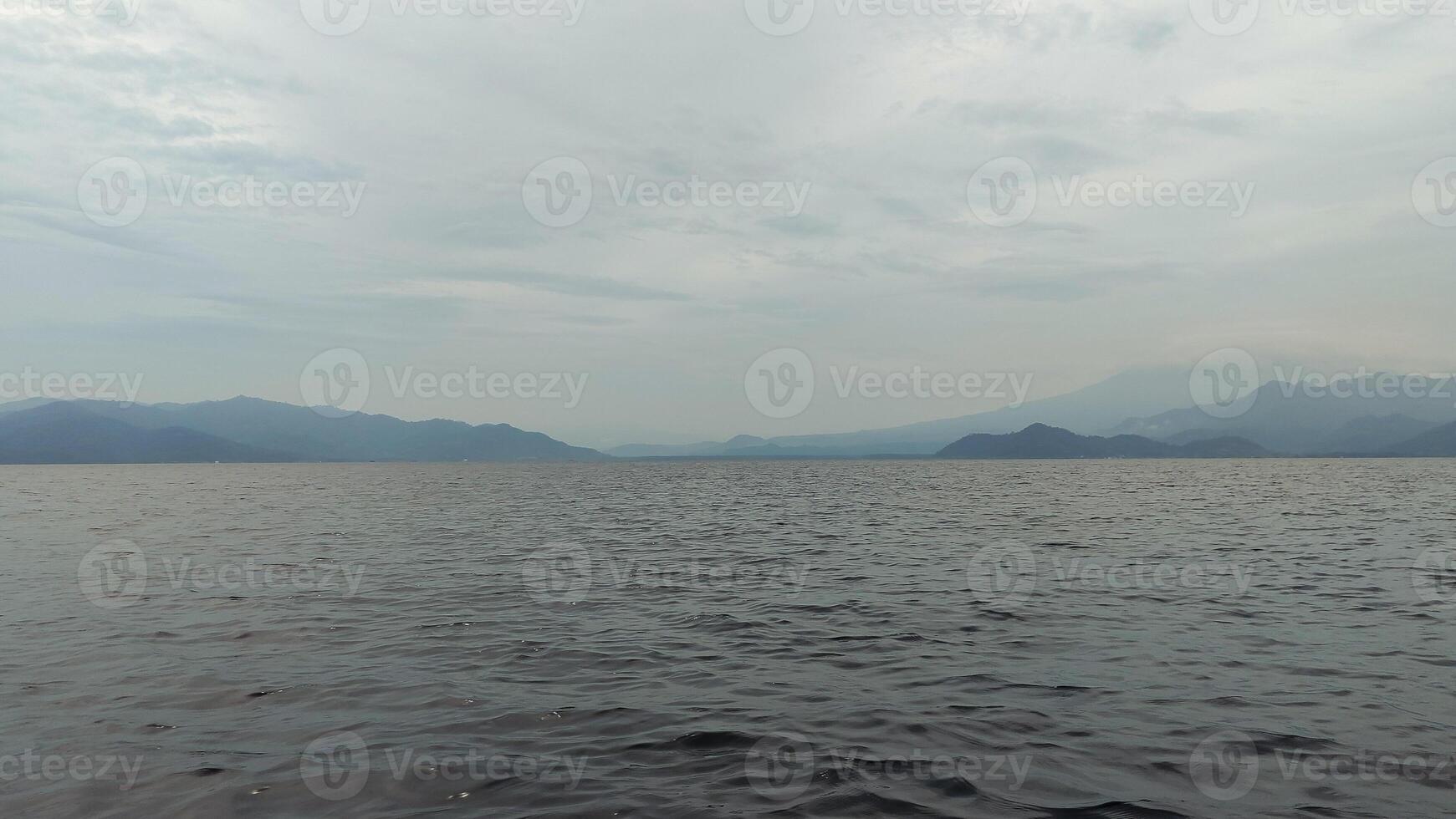 beautiful view of the tropical beach of Pahawang Island, Lampung. Landscape in the highland natural park. Panoramic view by the sea. photo