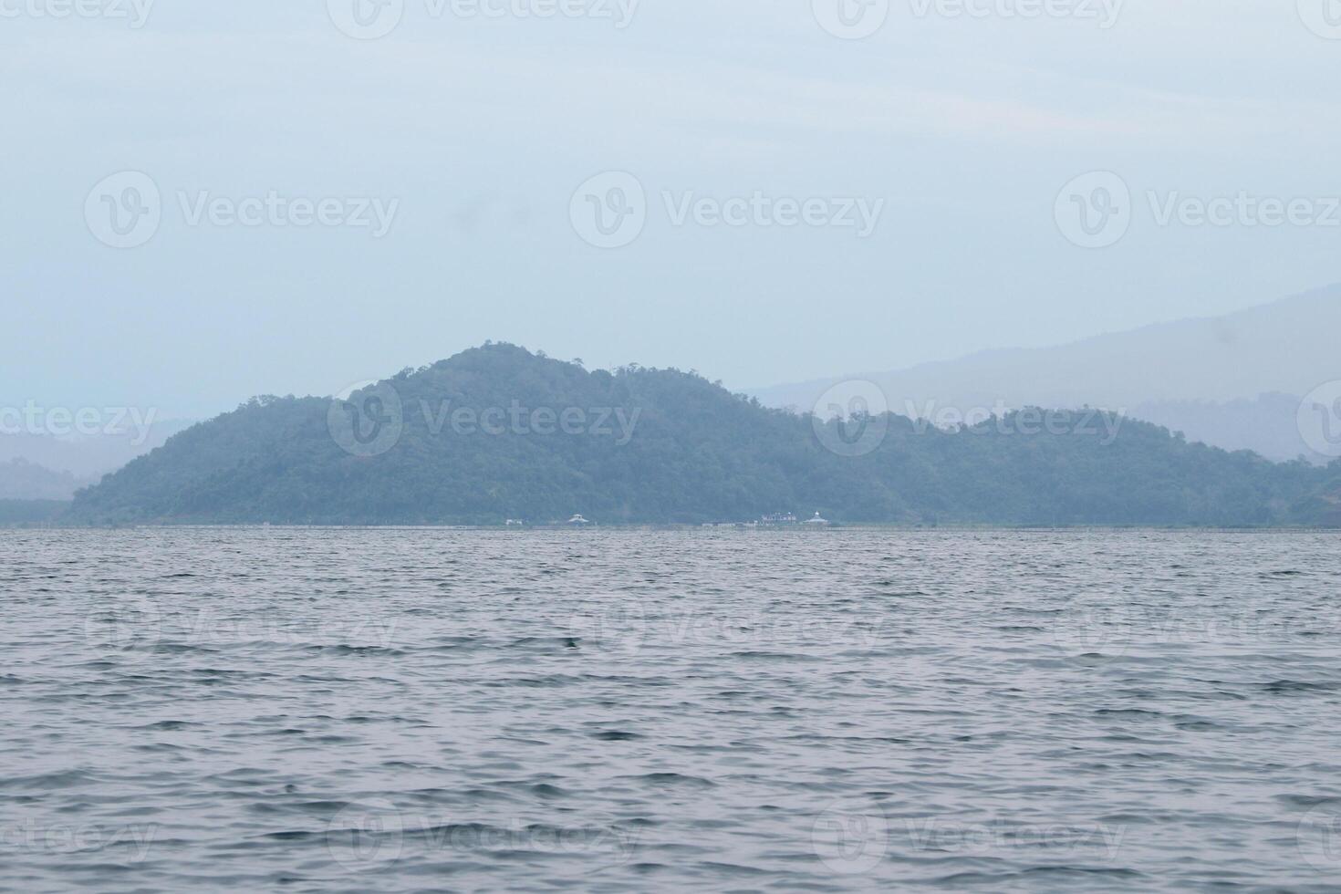 beautiful view of the tropical beach of Pahawang Island, Lampung. Landscape in the highland natural park. Panoramic view by the sea. photo