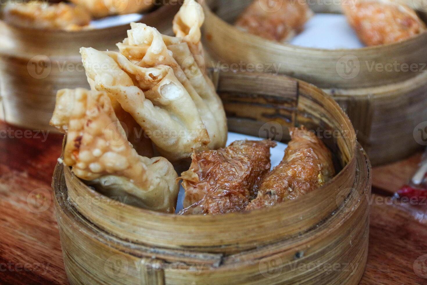 Gacoan noodles are a popular food in Indonesia. Made from noodles served with spicy spices and fried dumplings. photo