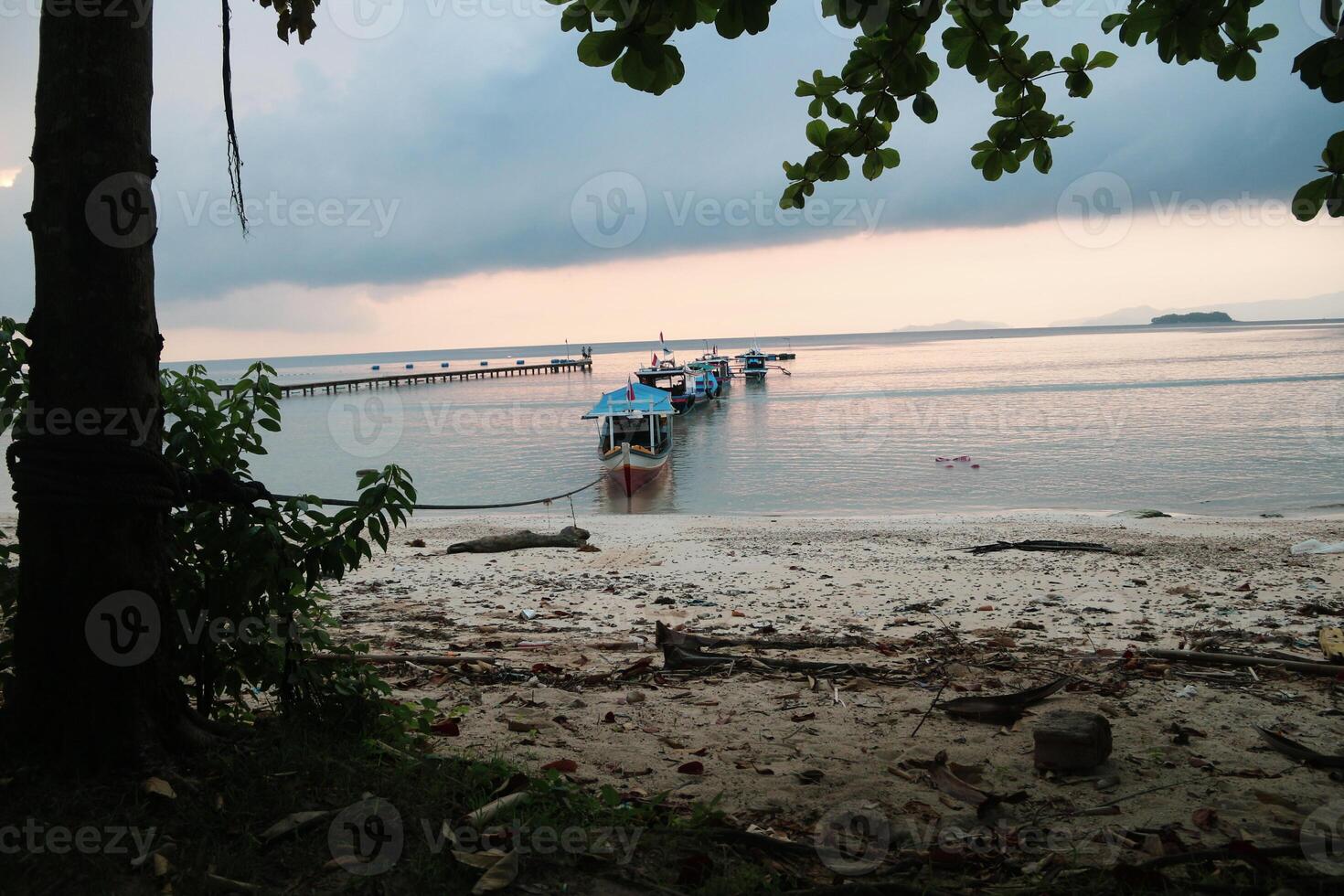 Traditional Indonesian fishing boats, boats and vessels in the waters of the Lampung region, Indonesia photo