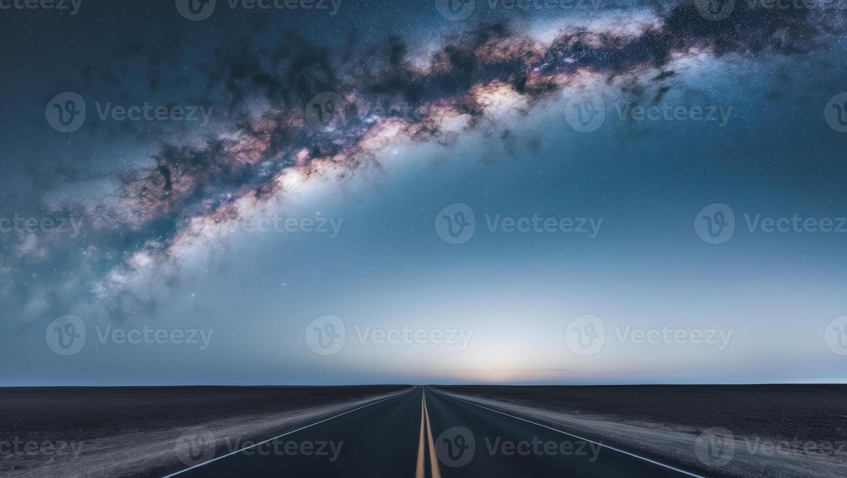 The milky way over the road in the desert photo