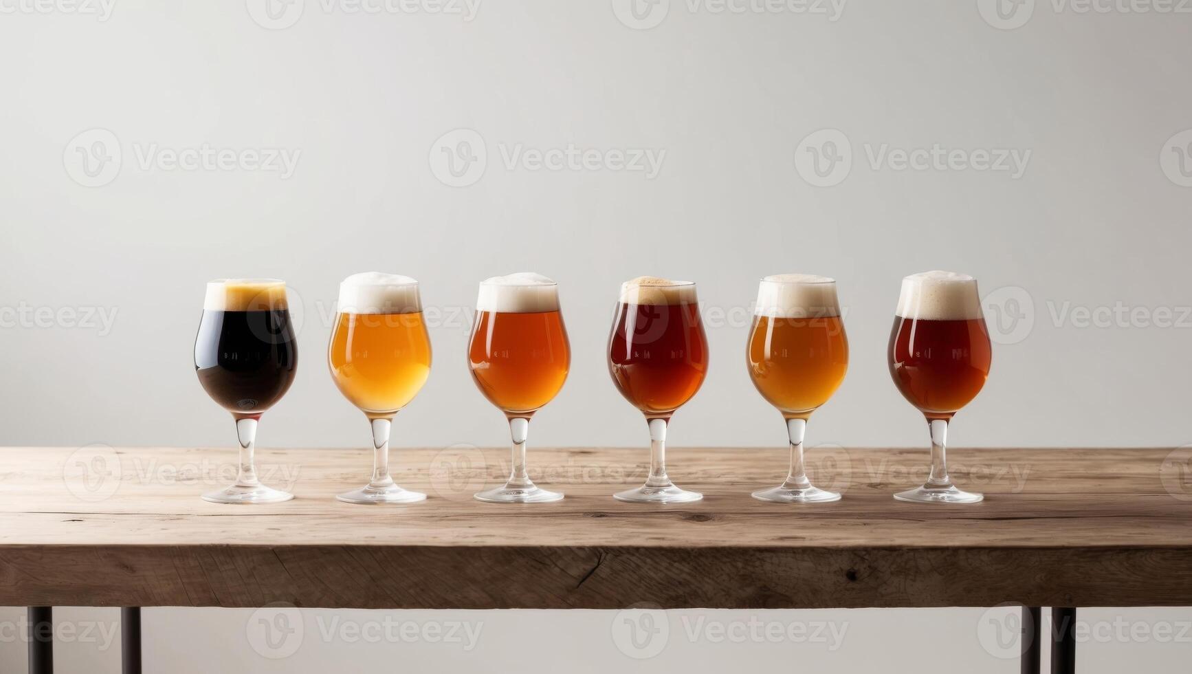 Six different types of beer are lined up on a table photo