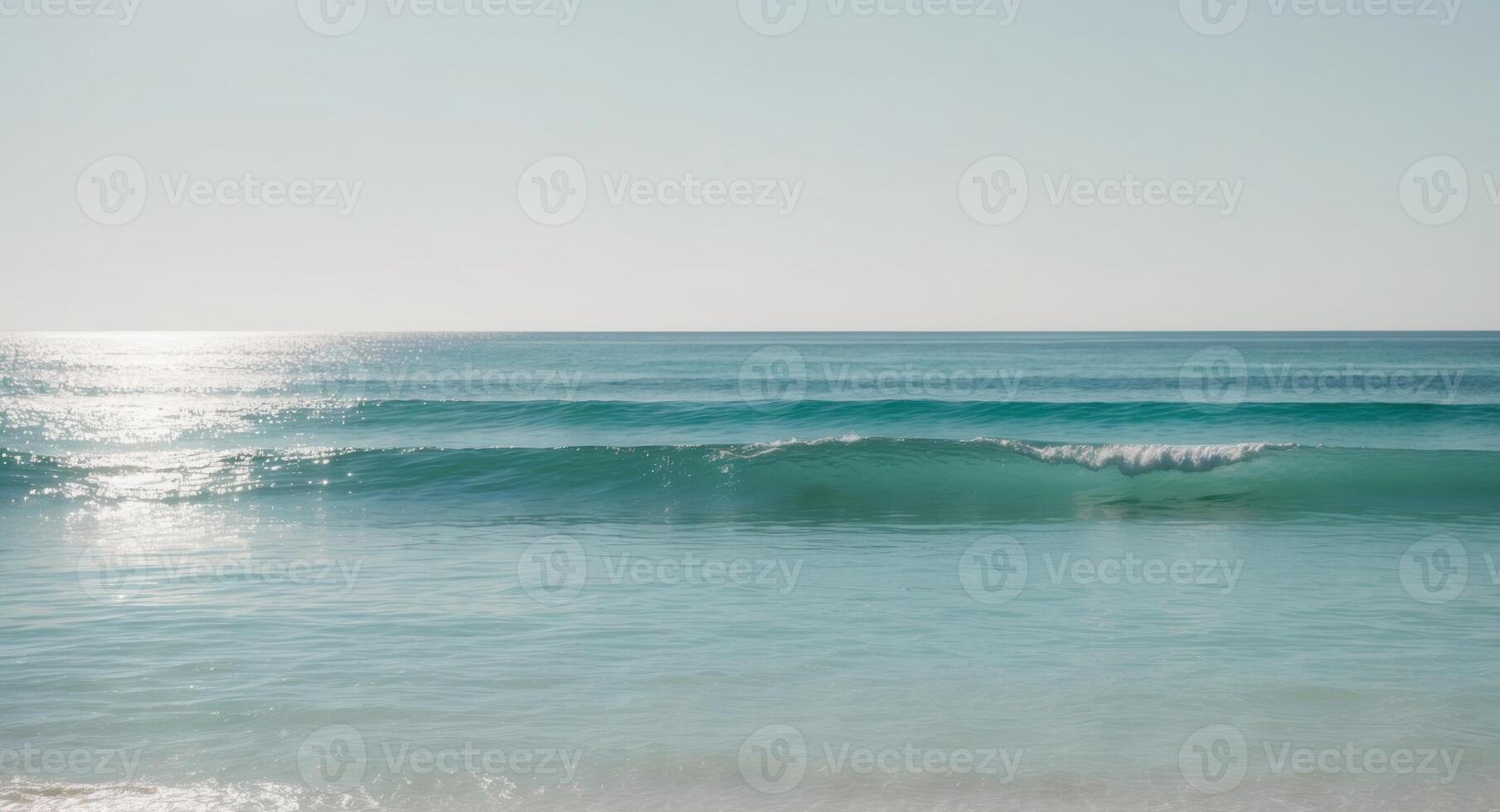 A surfer riding a wave on the beach photo