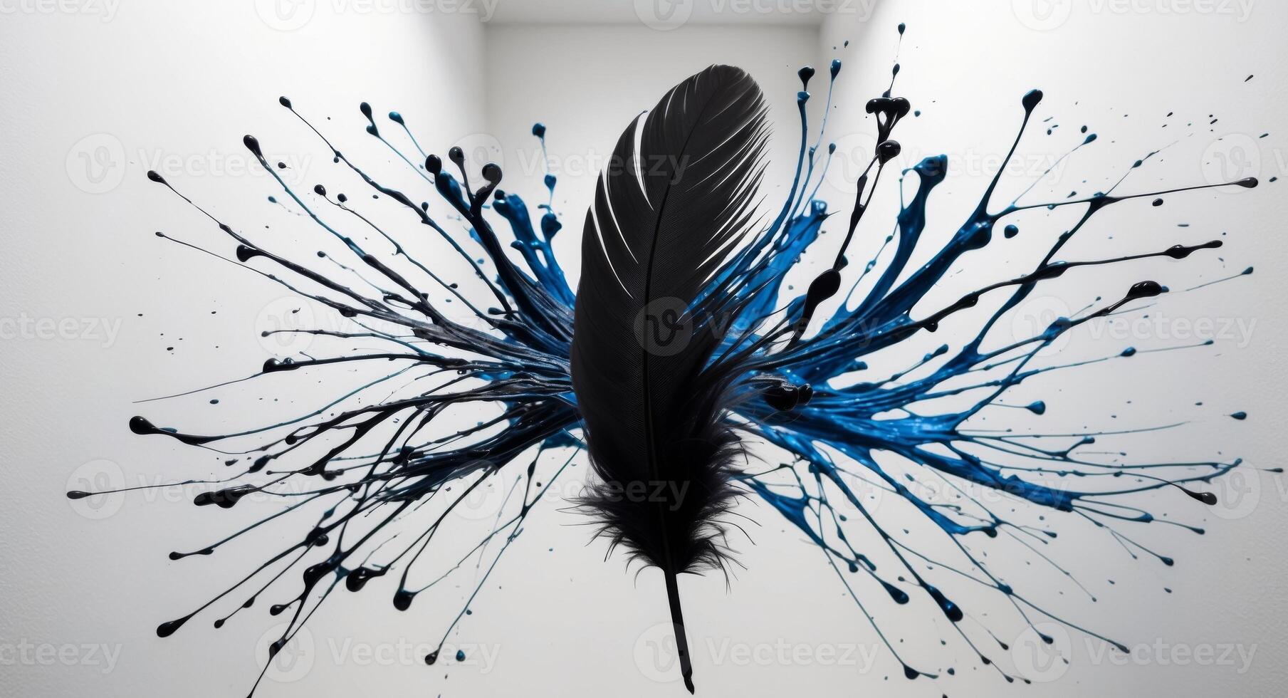 A black feather is surrounded by blue paint splashes photo