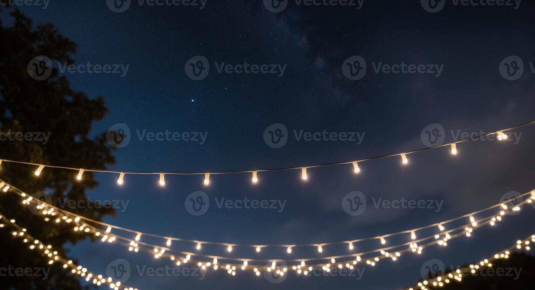 A string of lights are hanging from the ceiling photo