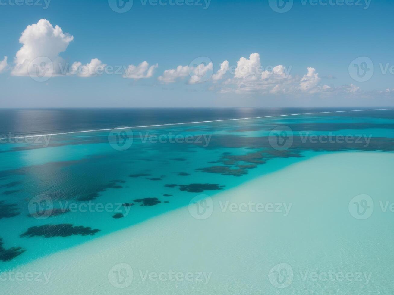 Aerial view of turquoise waters and white clouds photo