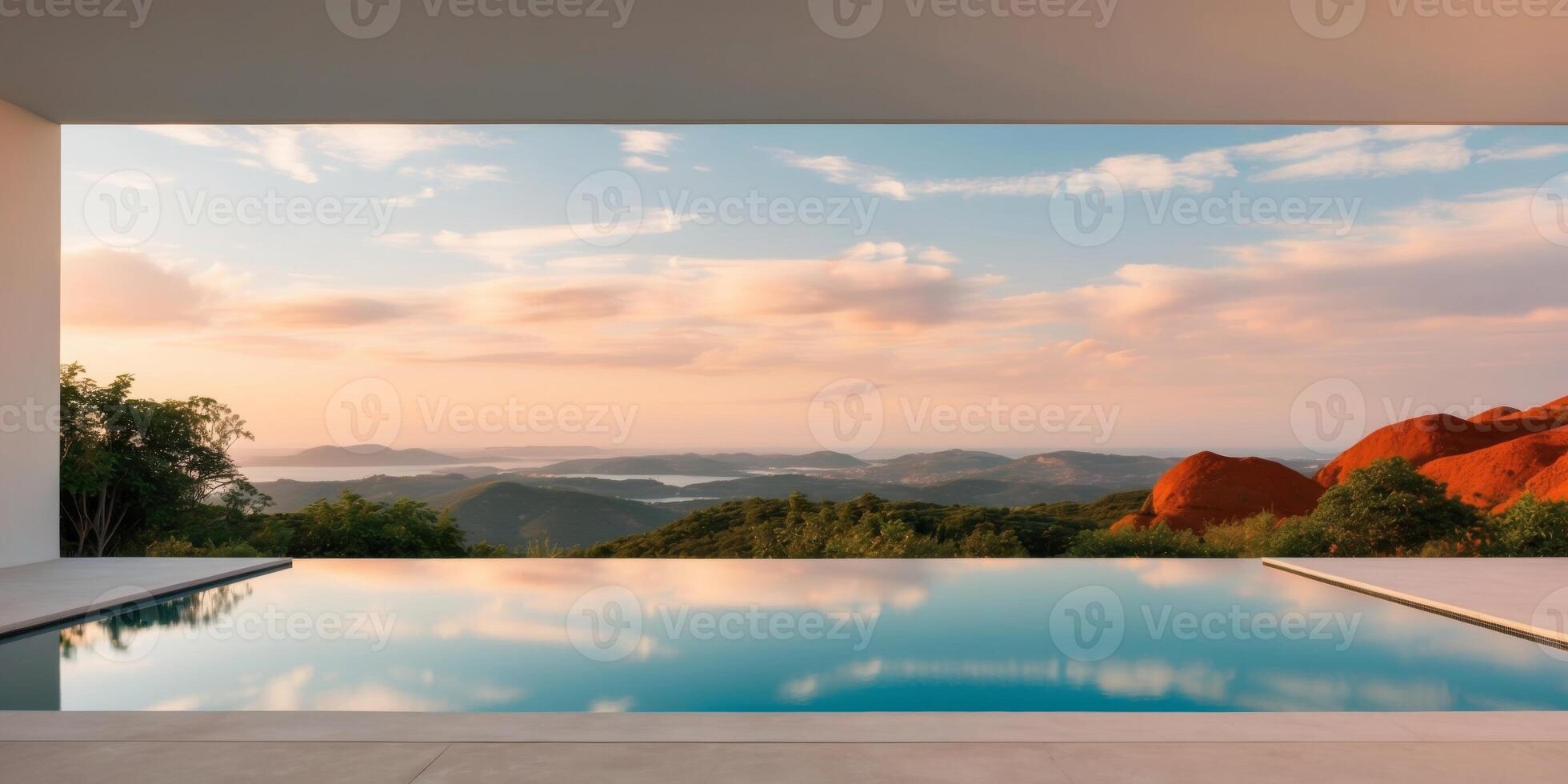 A pool with a view of the mountains at sunset photo