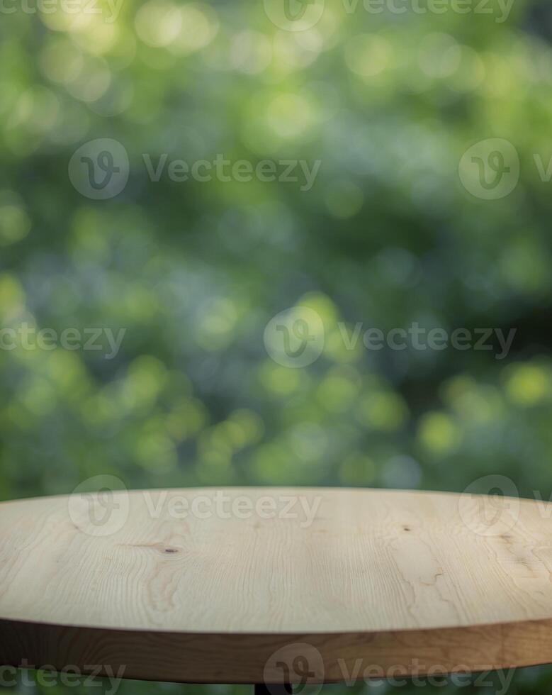 Empty wooden top table with blur green nature background photo