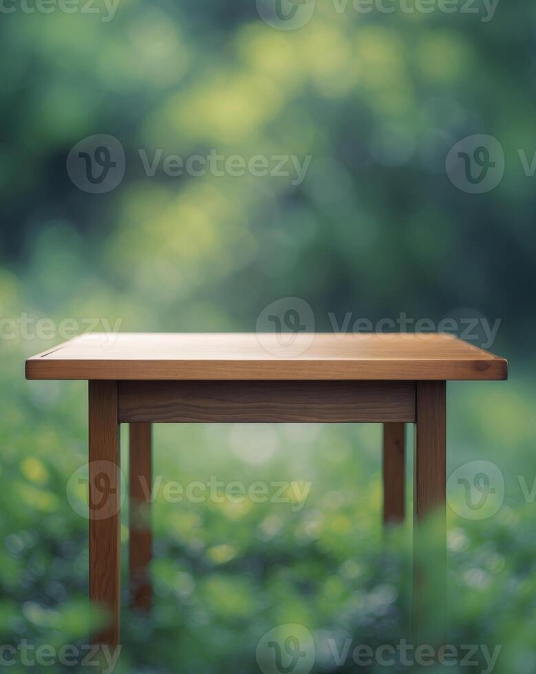 Empty wooden top table with blur green nature background photo