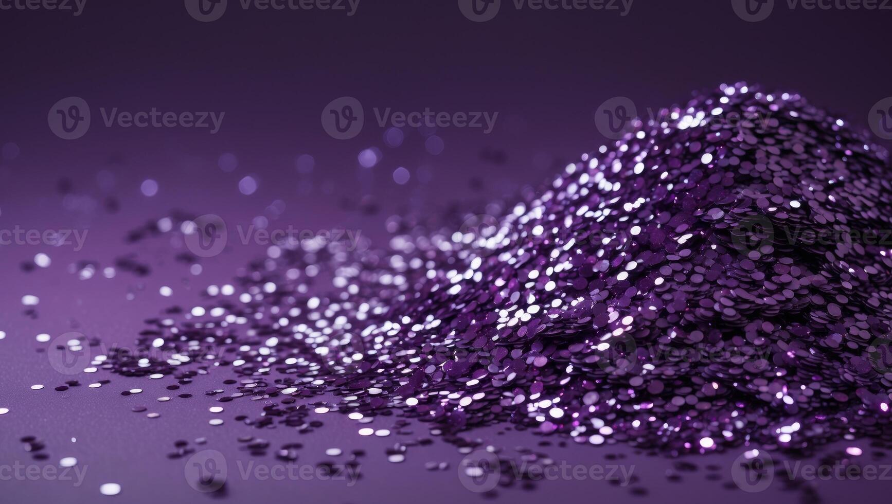 a close up image of purple glitter on a solid purple background highlighting the texture and shine in a monochromatic style photo