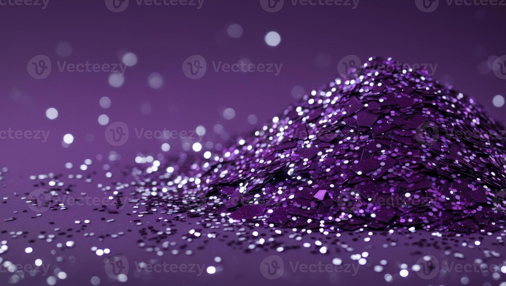 a close up image of purple glitter on a solid purple background highlighting the texture and shine in a monochromatic style photo