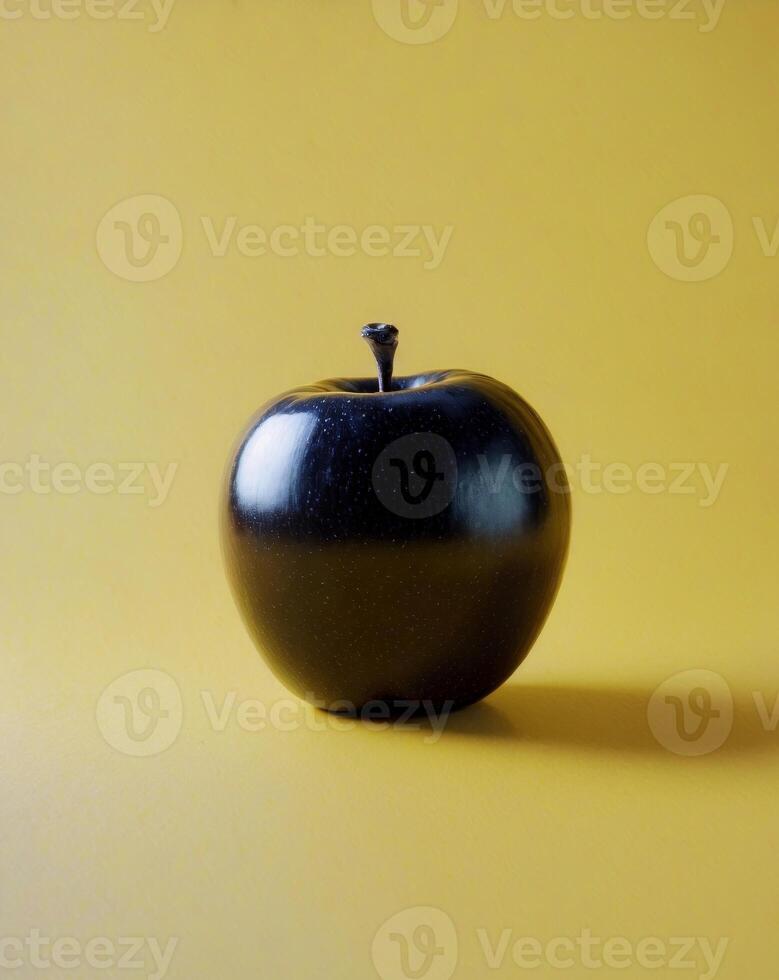 An apple on a yellow background photo