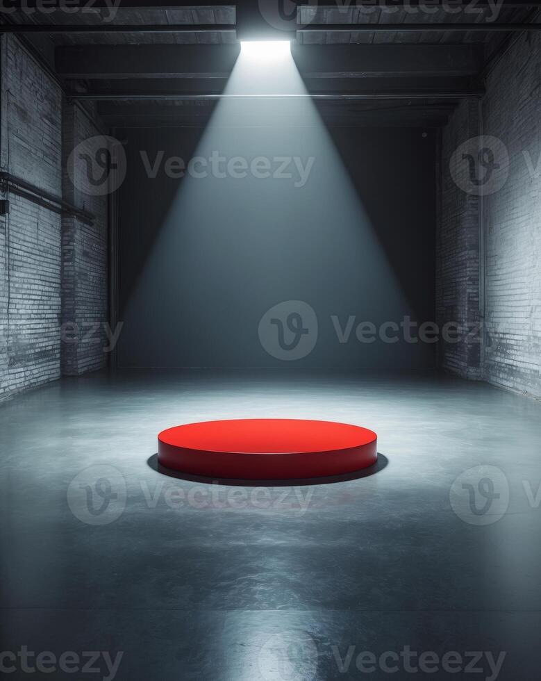 Red Circular Platform Illuminated by Spotlight in Empty Industrial Room photo