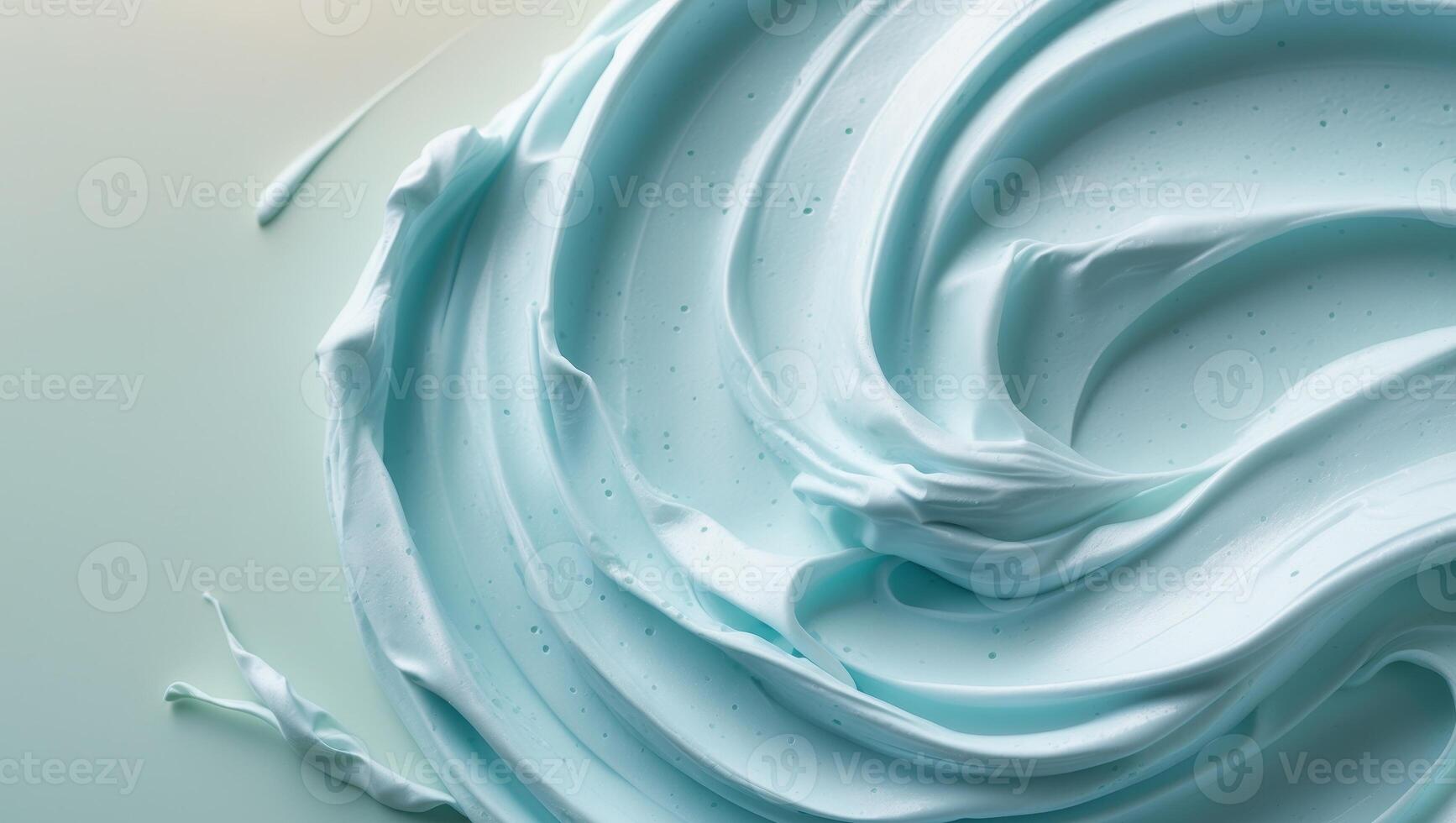 Swirling light blue cream texture on pastel background photo