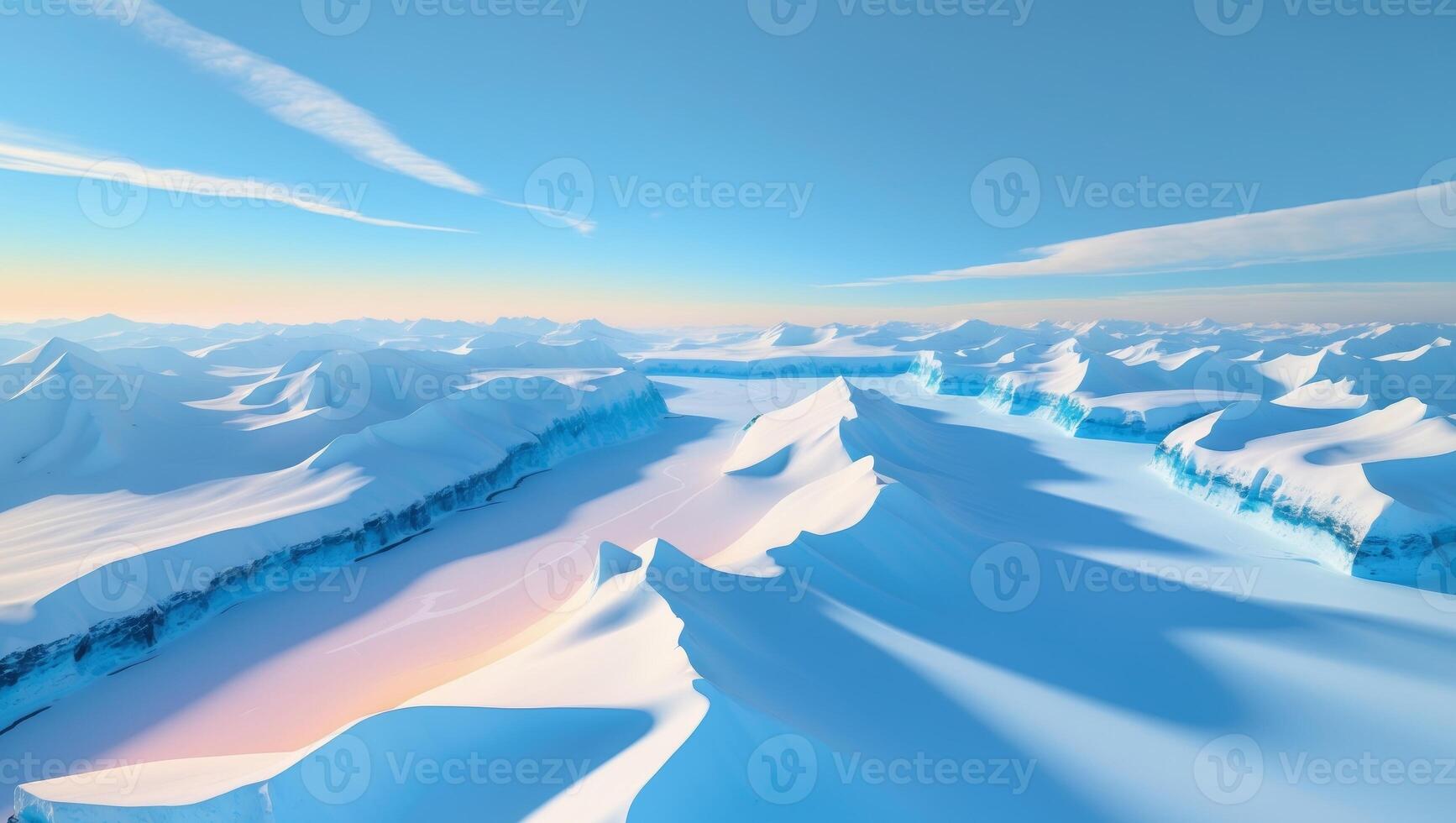 An aerial view of a snowy mountain range photo