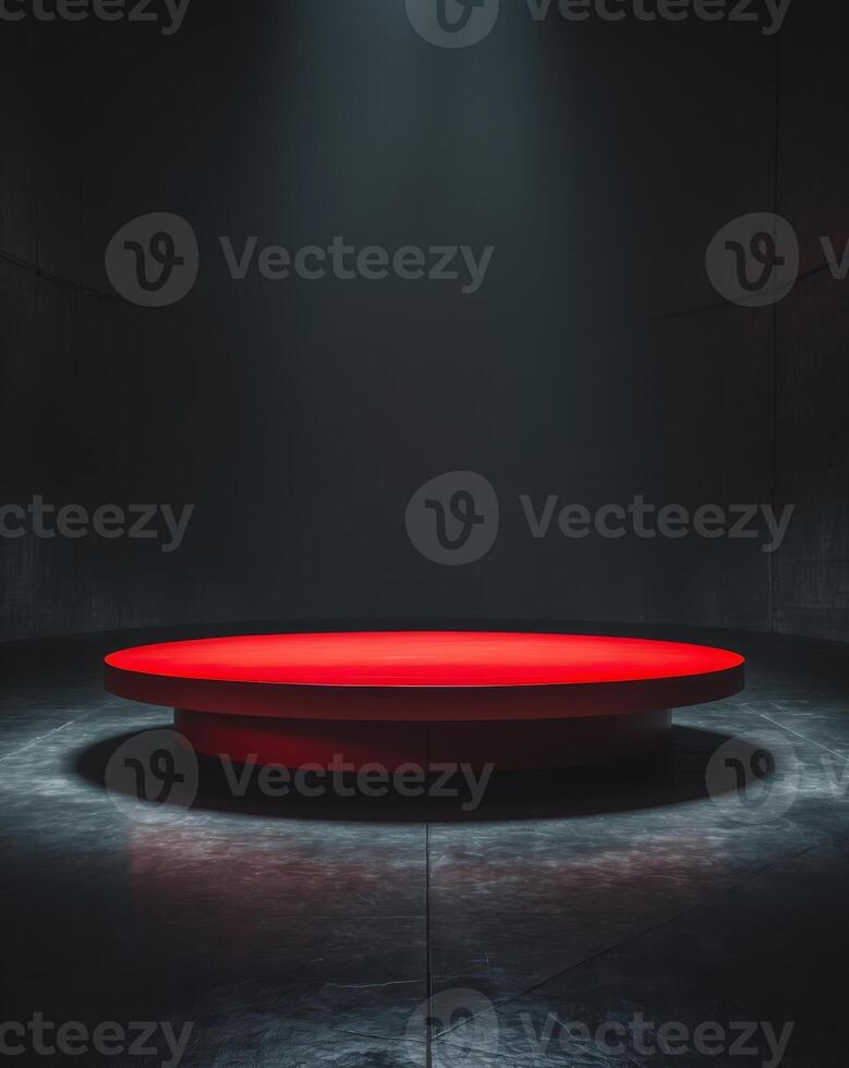 A red circular stage with a spotlight photo