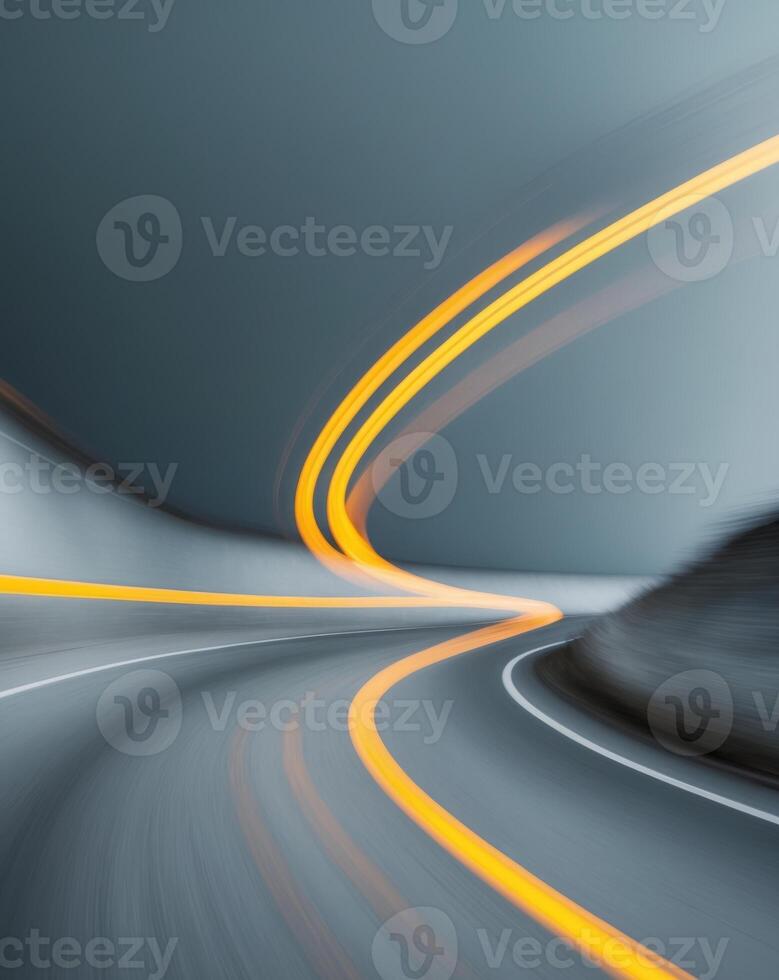 Motion Blur of Curving Road with Vibrant Yellow and Orange Lines photo