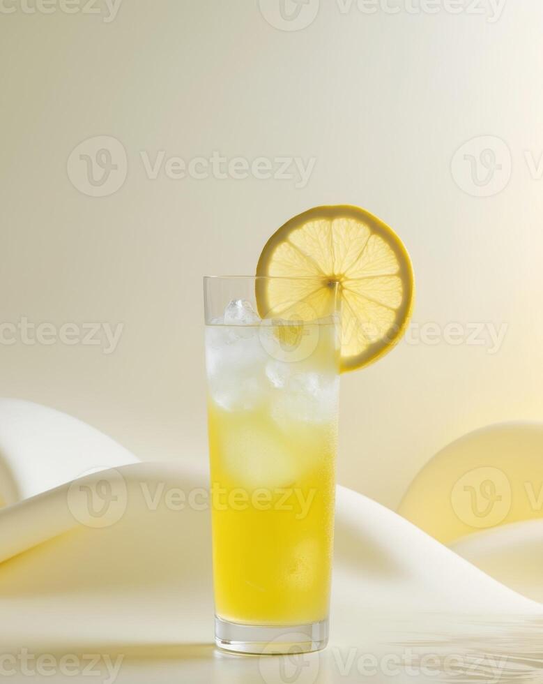 Refreshing citrus drink with ice and lemon on a light background photo