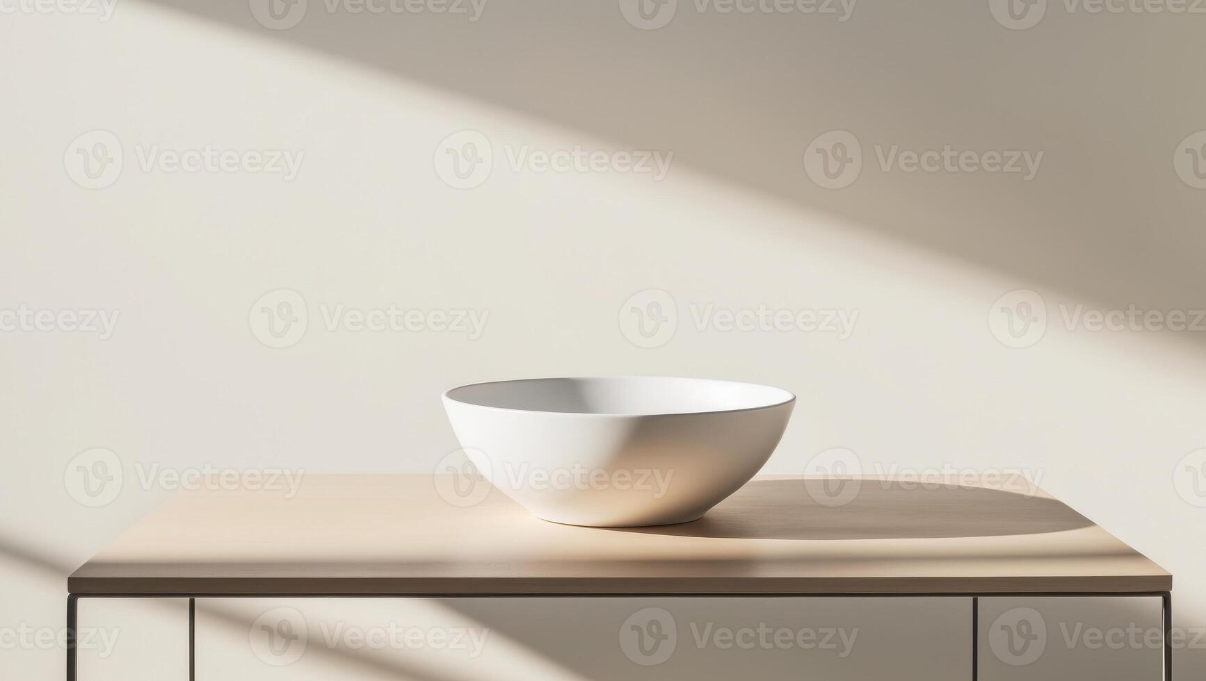 A white bowl sitting on top of a table photo