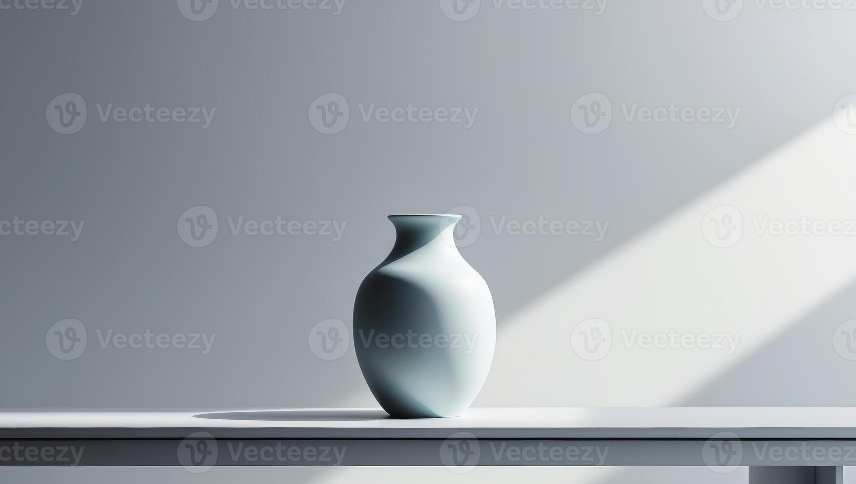 A vase is sitting on a table in front of a wall photo