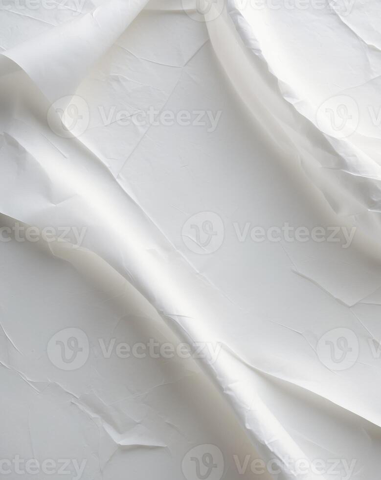 Blank white textured paper with subtle creases and imperfections showcasing a simple and clean background suitable for various creative projects photo