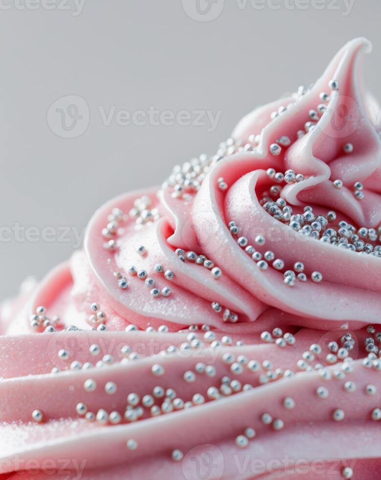 A close up of a frosted cupcake with sprinkles photo