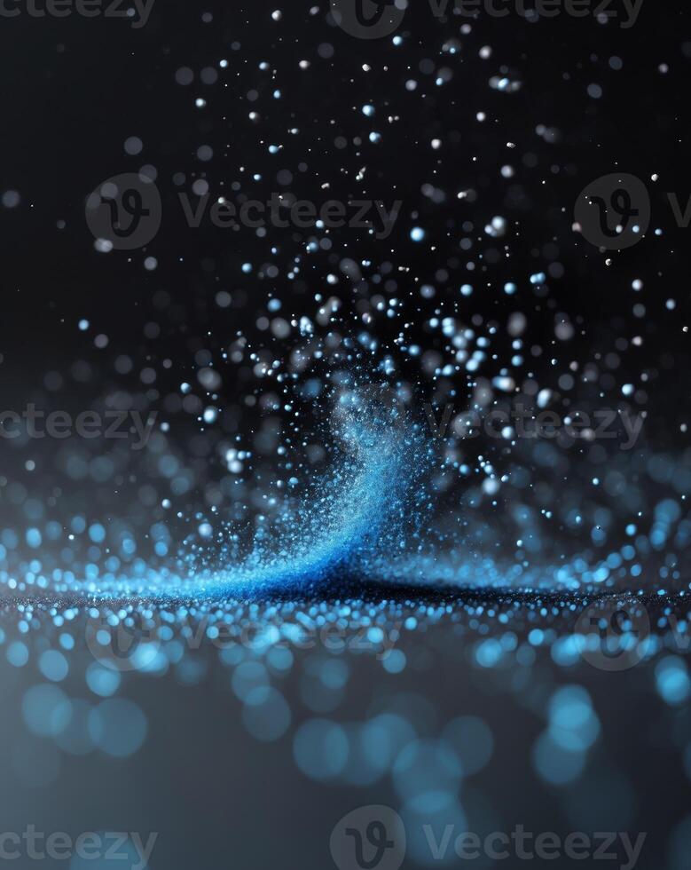 A dark background with blue dust particles scattered throughout photo
