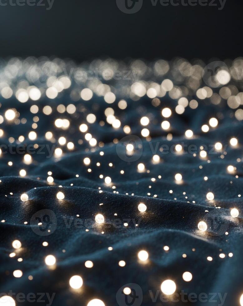 A large group of lights on a black surface photo